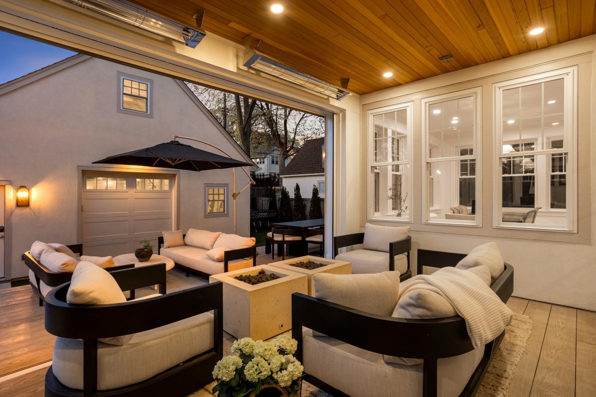 Oak ceiling, mounted heaters, fire pits serviced with gas lines for ease of use