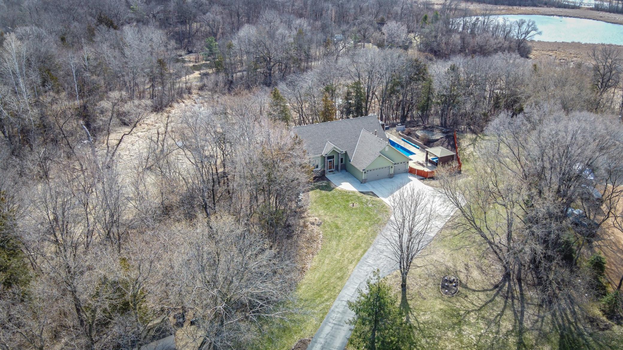Wetlands beyond the home ensure that you'll always have a natural setting behind you.