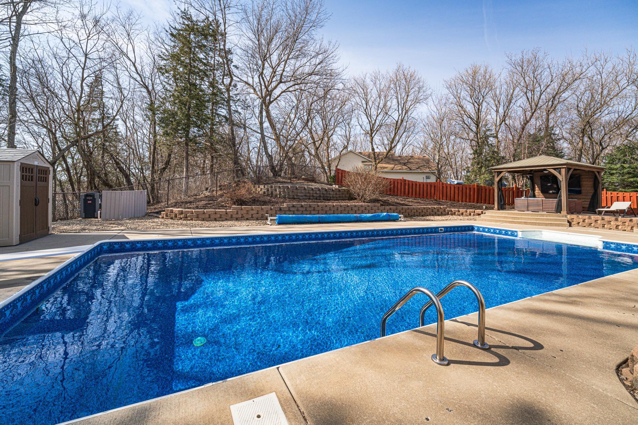 The set up has tremendous pool patio space for lots of guests, and includes a shed for the pool toys, as well as a gazebo with an 83" TV for poolside "chilling."