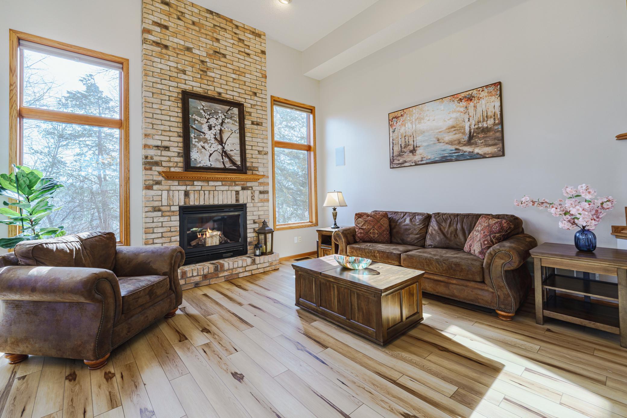 The family room has recessed lighting and abundant natural light.