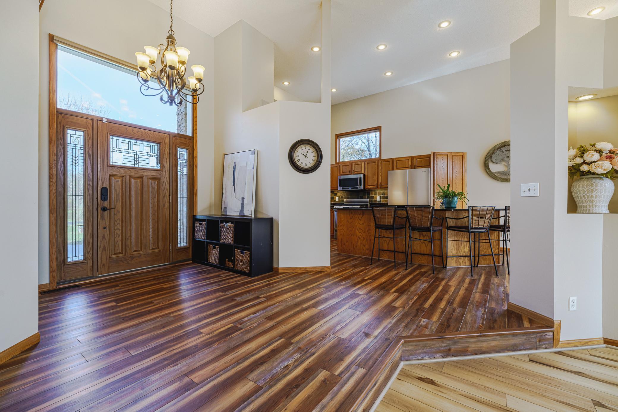 The entry foyer opens to the kitchen and Great Room.