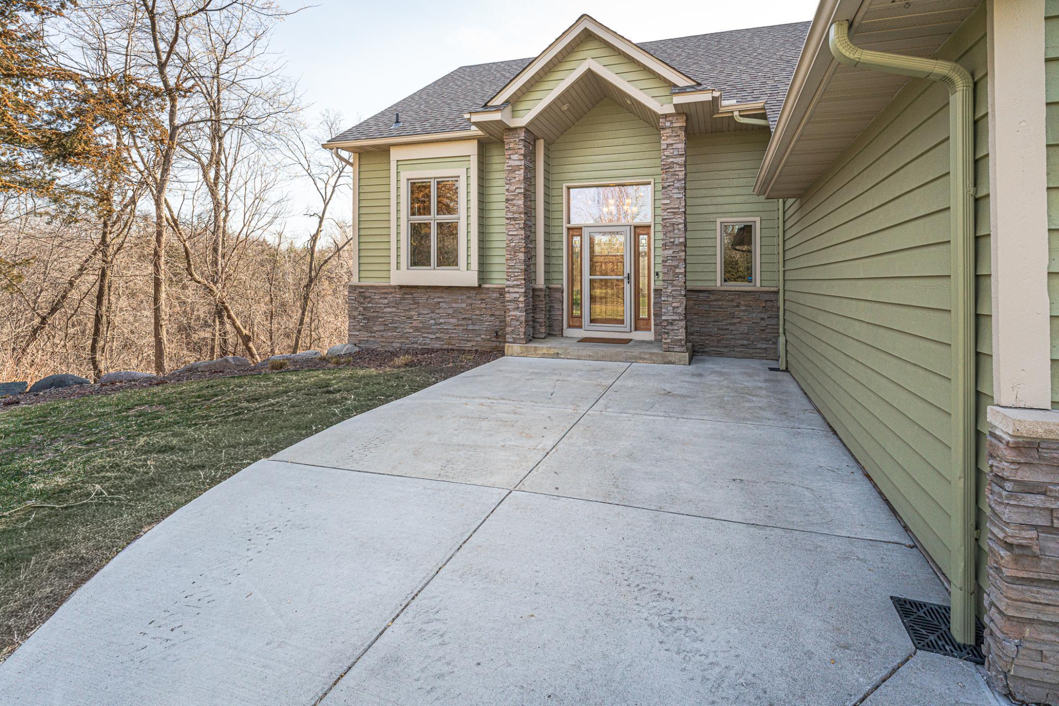 This home has a new concrete apron/front walkway, and extra wide driveway. This makes a great seating area.
