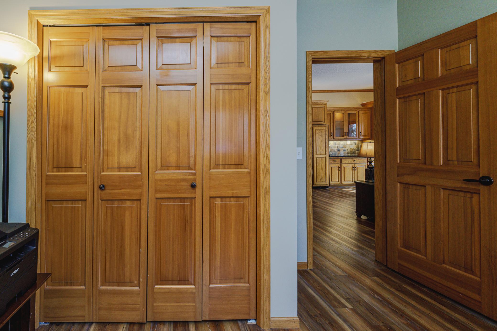 There are solid-panel doors throughout.