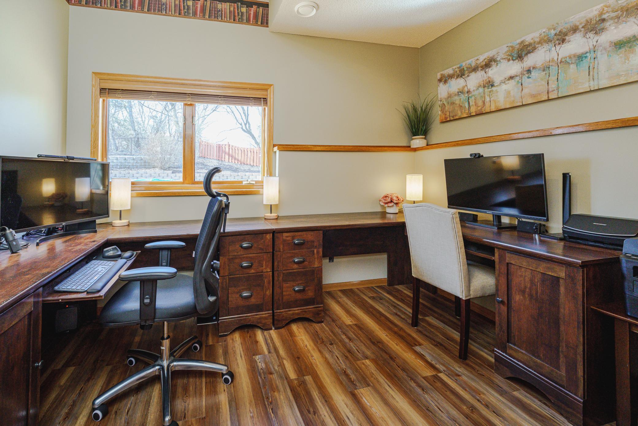 This bedroom is currently being used as an office. The desks in this space fit perfectly and can be left for the buyer if desired.