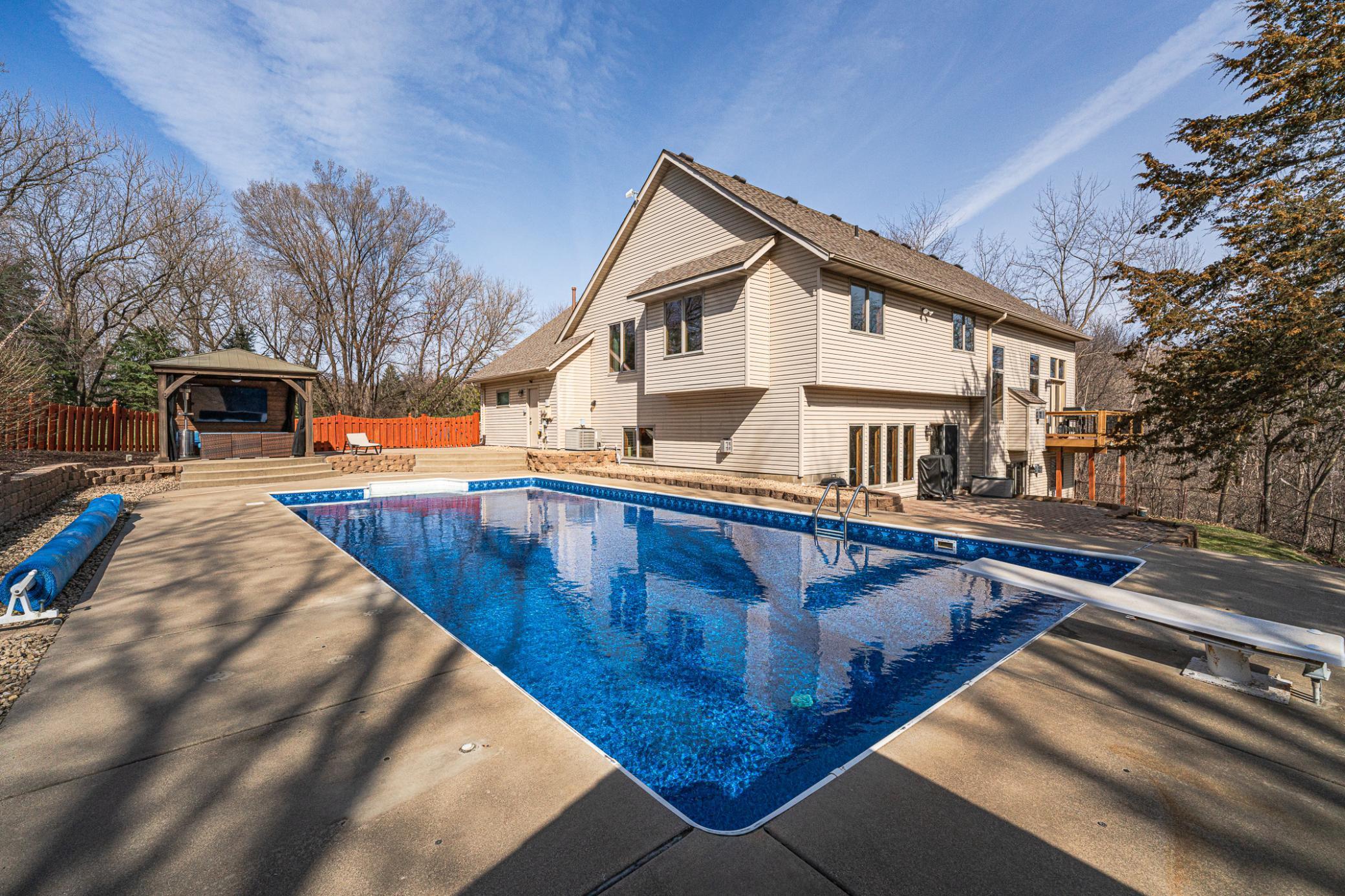 This refreshing pool has a diving board for family fun!