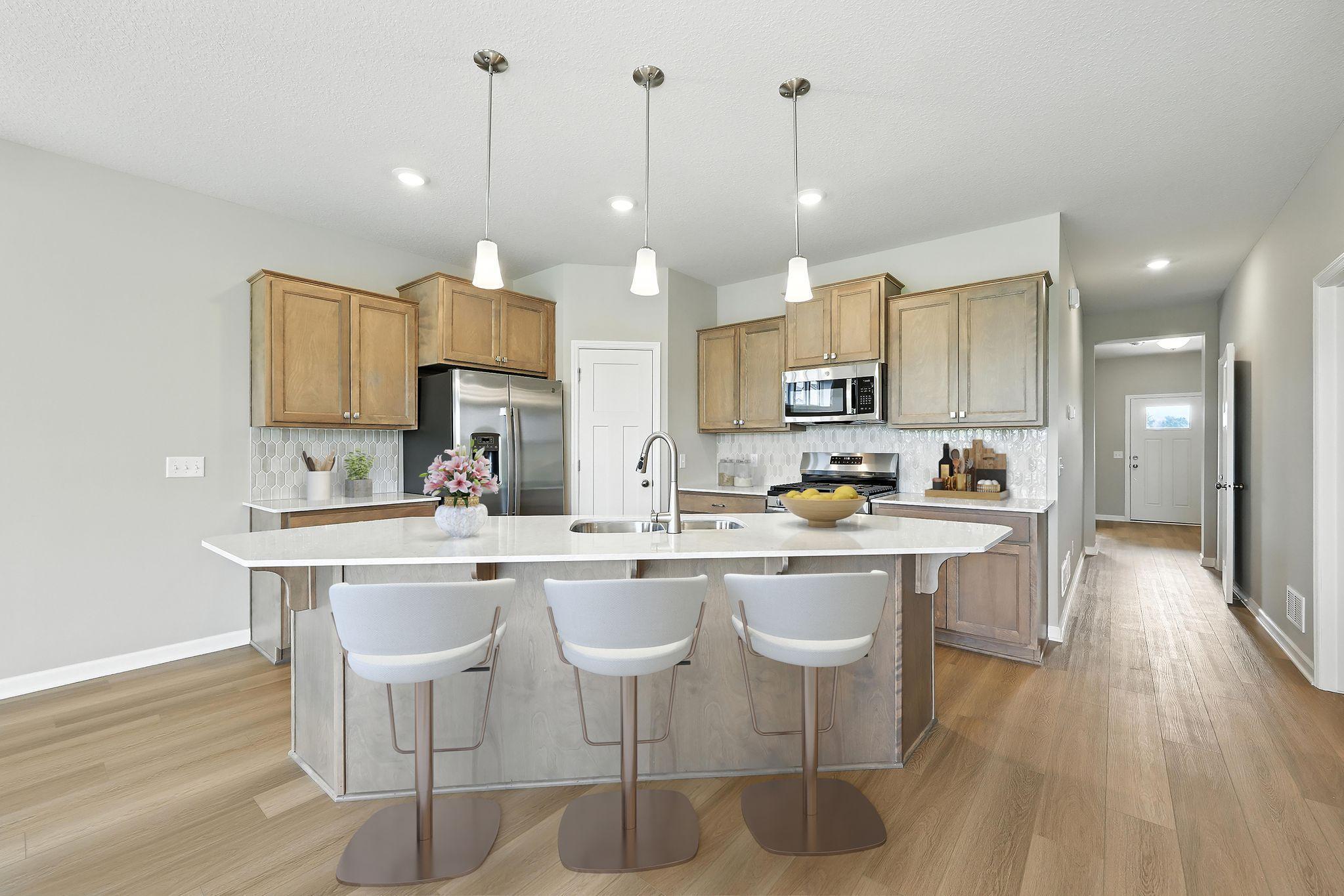 Kitchen *Photo of a previously built home of the same floor plan. Finishes/options may vary.
