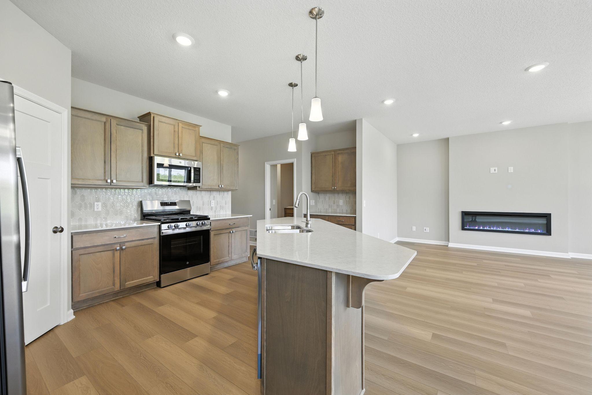 Kitchen *Photo of a previously built home of the same floor plan. Finishes/options may vary.
