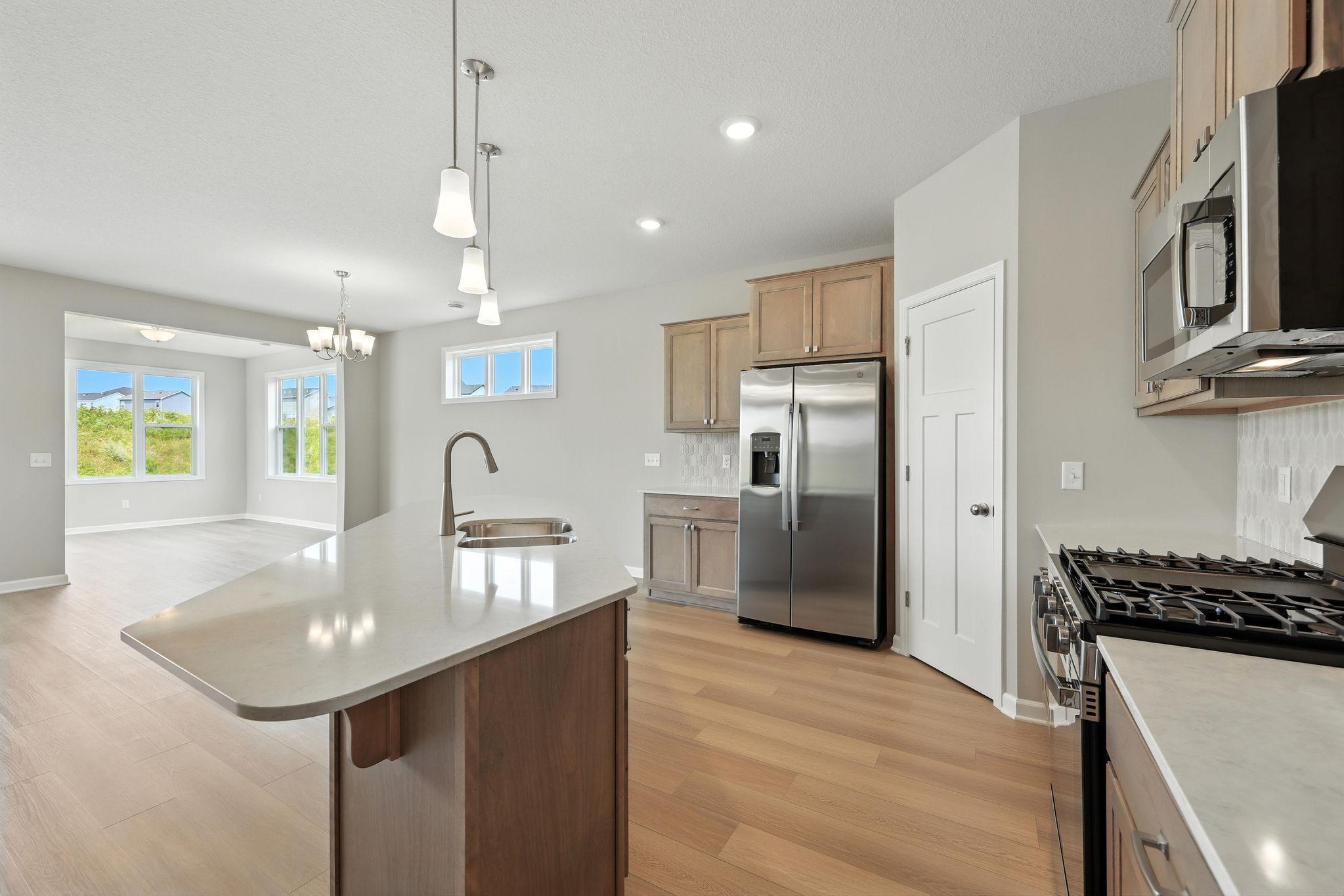 Kitchen *Photo of a previously built home of the same floor plan. Finishes/options may vary.