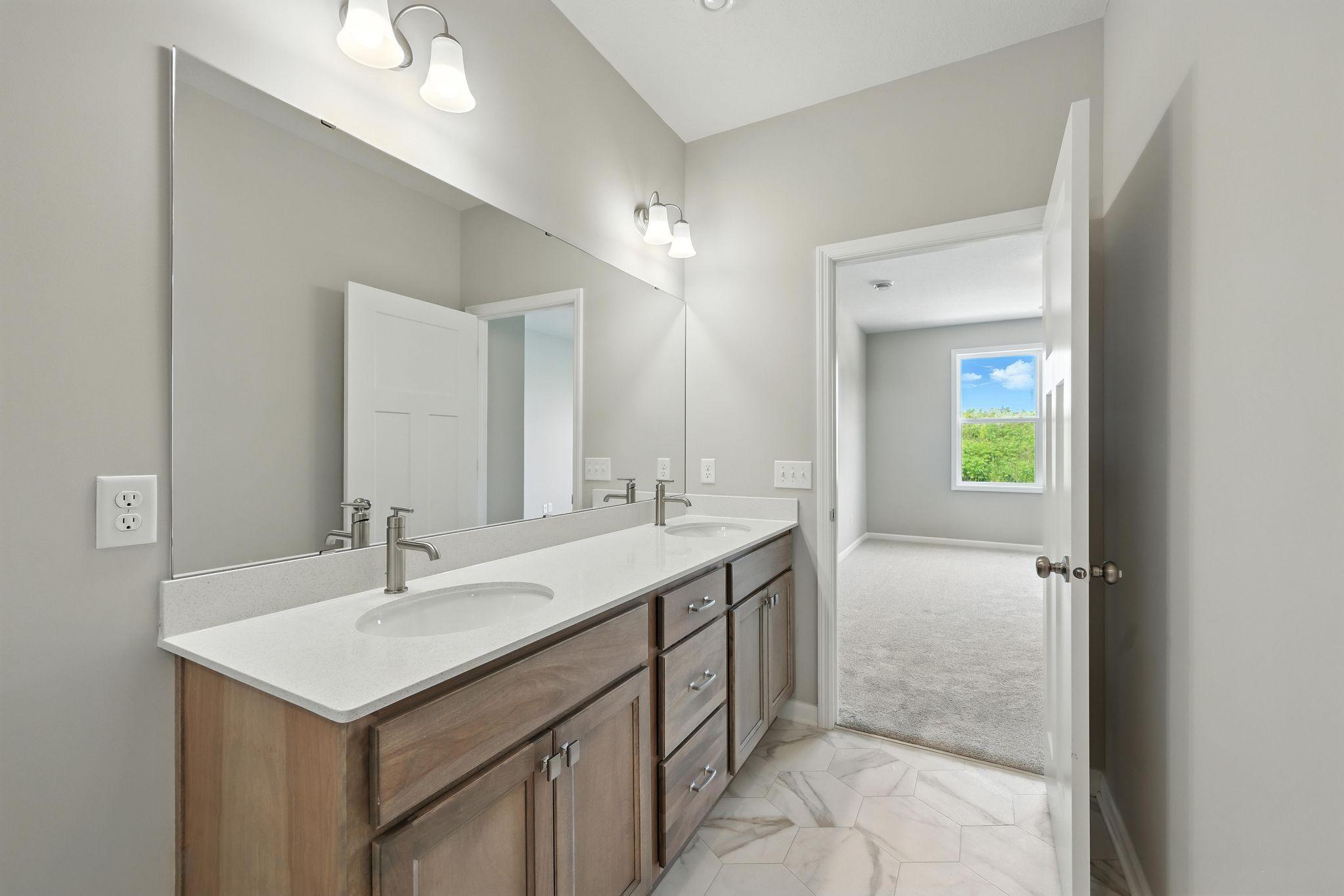 Owner's Bathroom *Photo of a previously built home of the same floor plan. Finishes/options may vary.