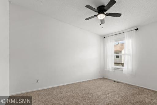 Spacious primary bedroom with ample closet space