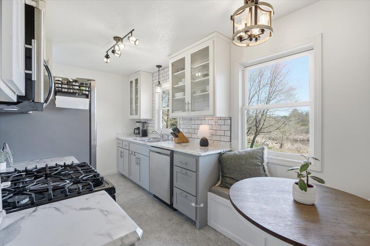 Eat in kitchen with even more natural light through large windows!