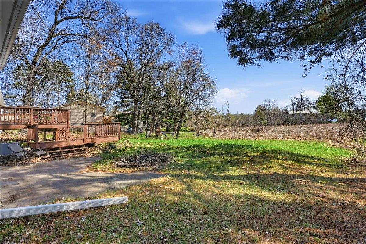 Patio space for additional backyard enjoyment.