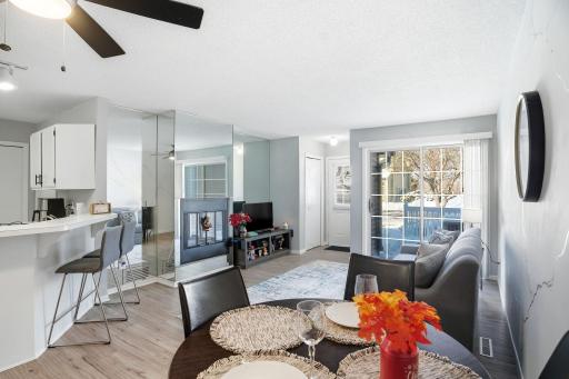 Adjacent patio offers tons of natural & easy access for summer grilling.l light