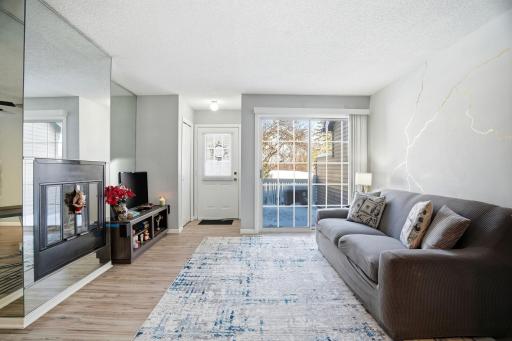 Enjoy this open & airy home with fresh paint & flooring!