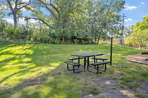 Picnic Area â Relax or entertain outdoors at the picnic table and green space.