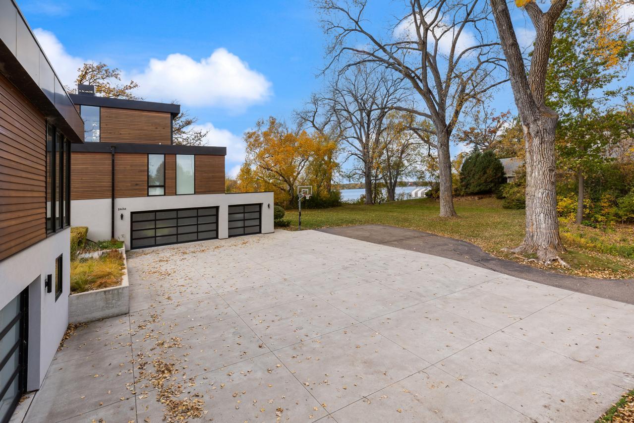 Attached Heated 3-car Garage leads into Mud Room and lower level Laundry