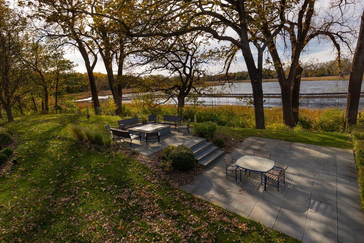Patio and Firepit with beautiful views of the lake.