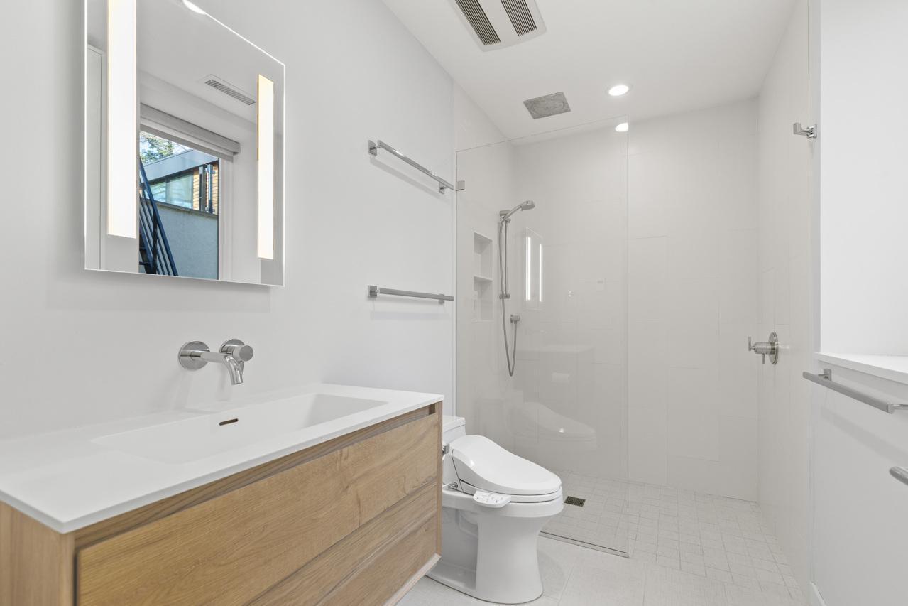 Lower level Guest bath - with bidet seat with hot water and air.