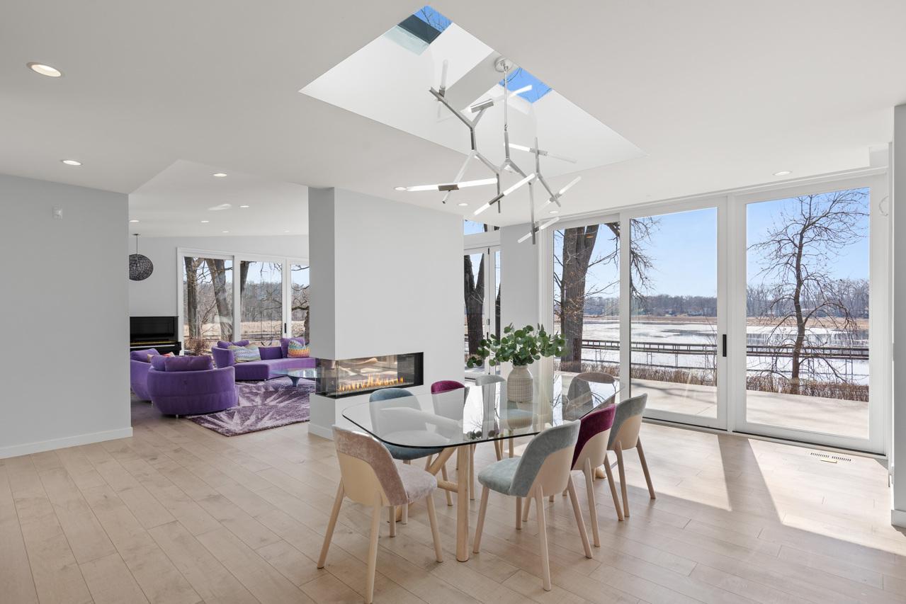 Dining opens up to the living room and outdoor patio.