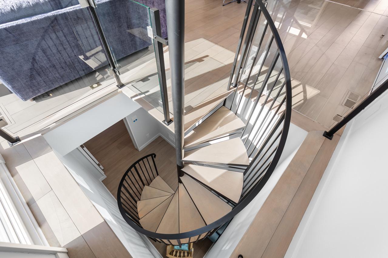 Spiral staircase to lower garage - Guest House
