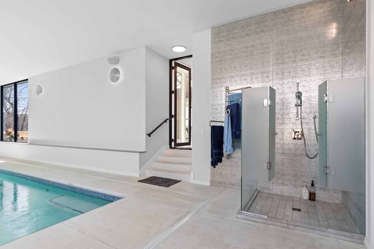 Pool room includes a shower.
