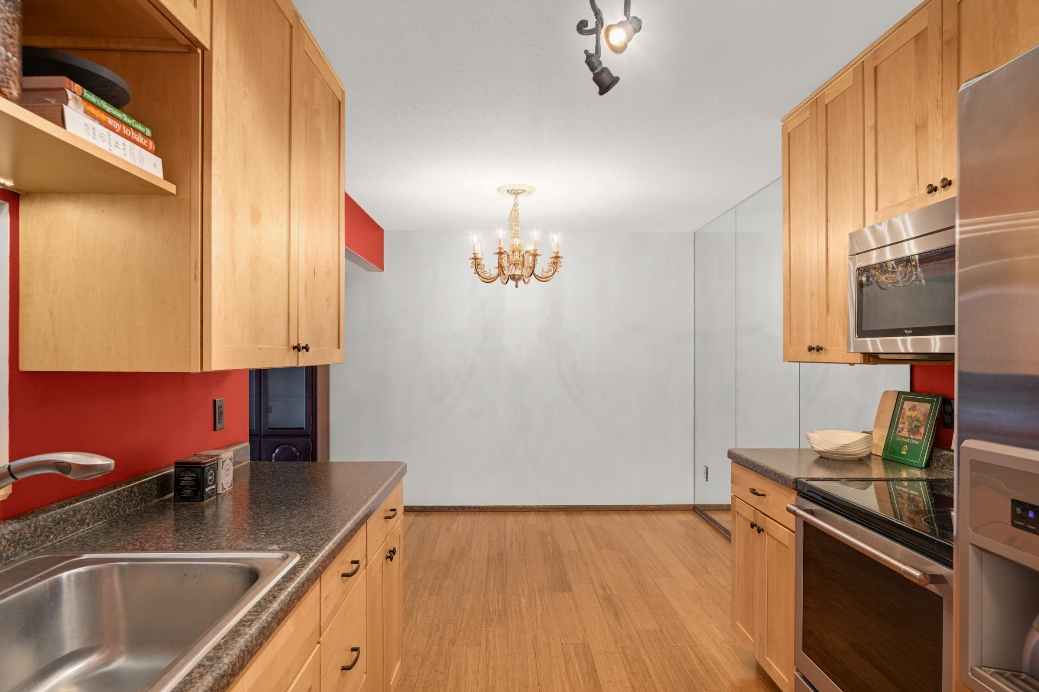 Kitchen w: bamboo floors into the dining room.jpg