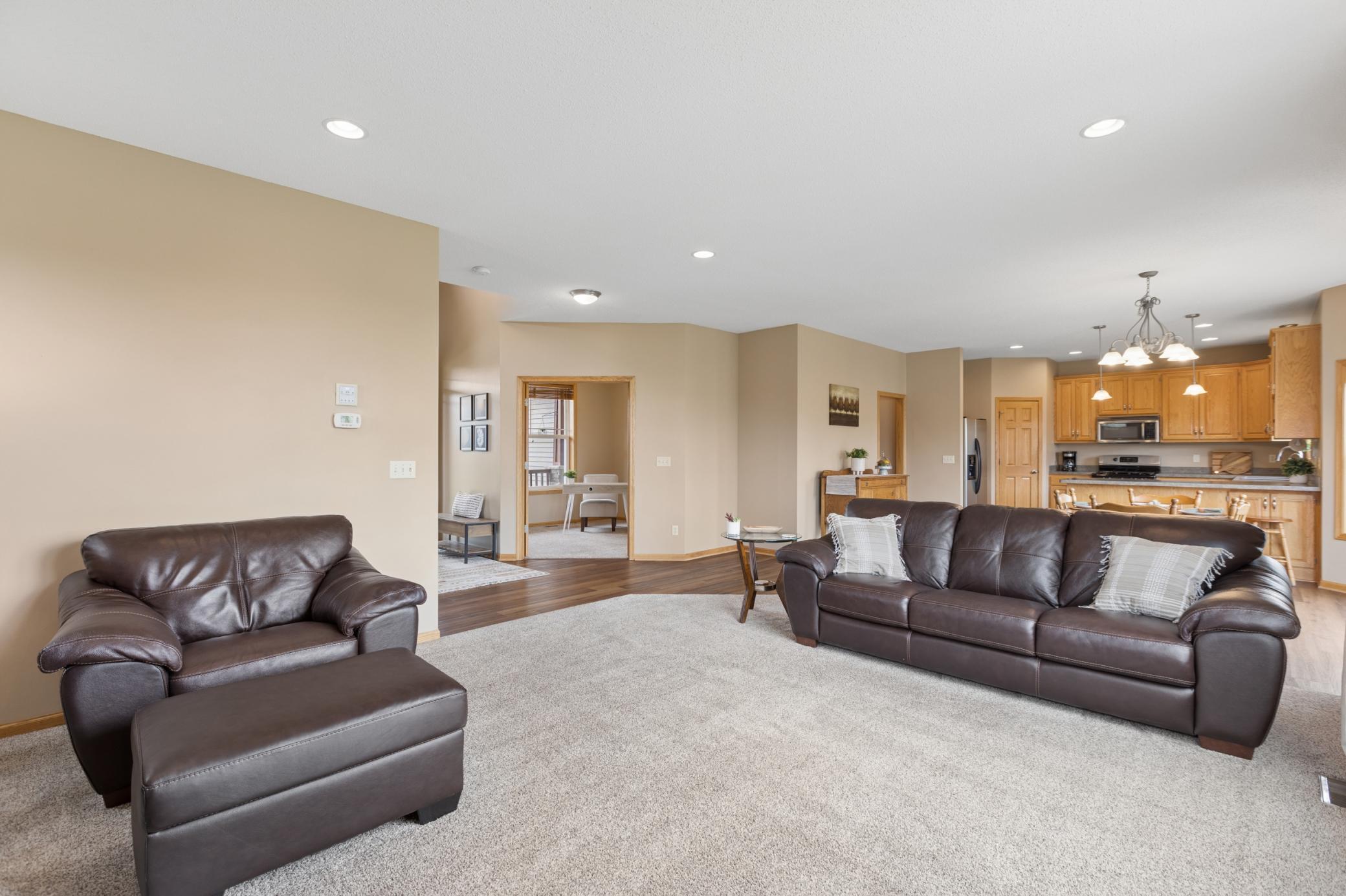 Main floor living room has recessed lighting