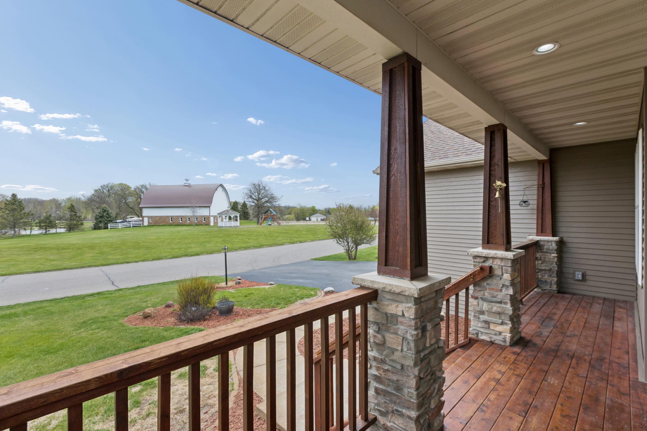 The current owners say this is one of their favorite parts of the house. Welcoming front porch.