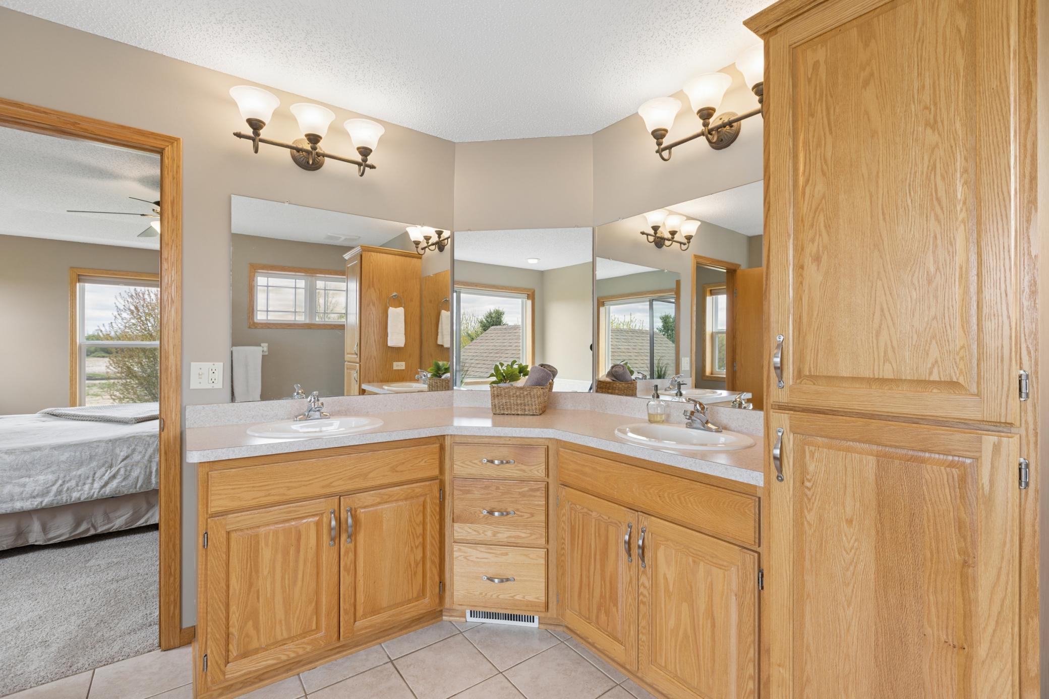 Large double vanity loaded with cabinets