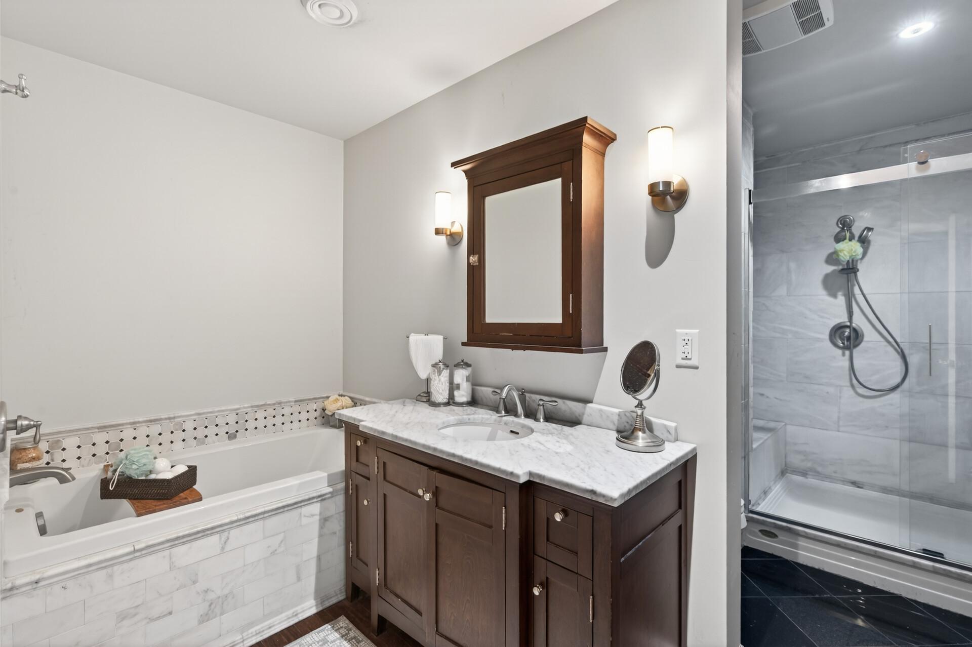 Full bath in the lower level with a walk-in shower to die for.