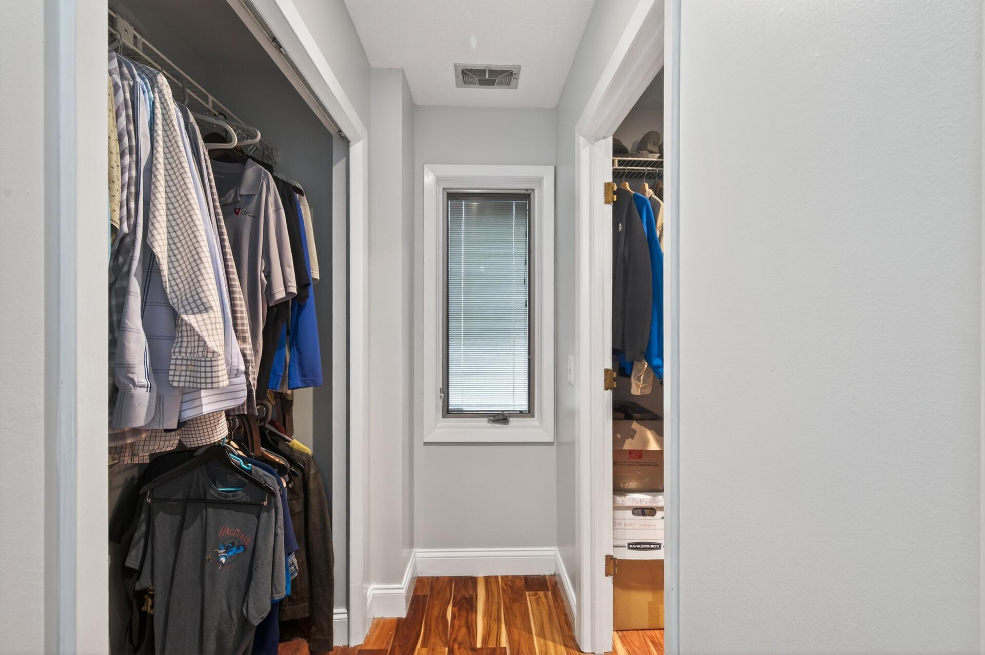 His and hers closet off primary bedroom.
