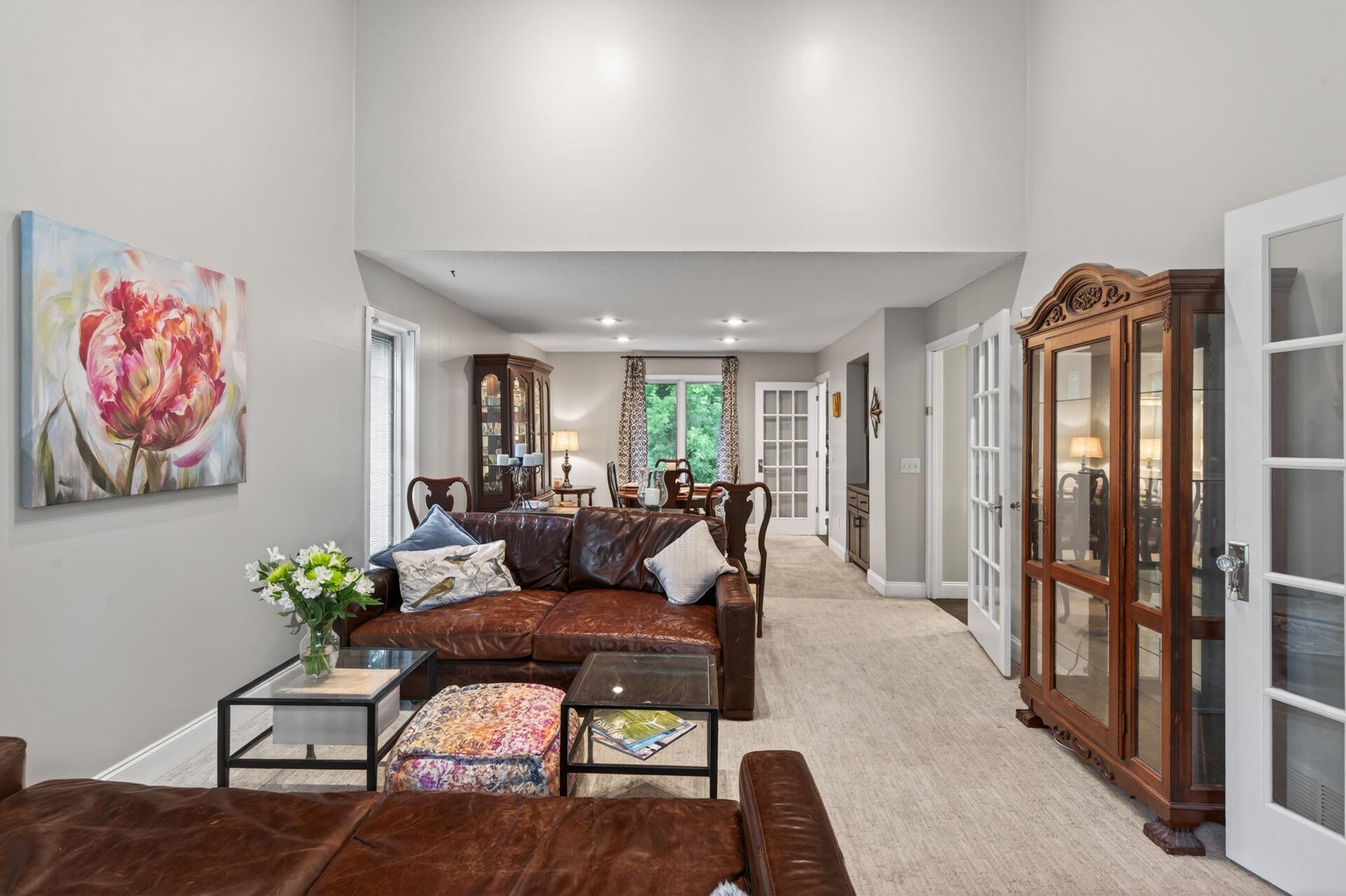 Main level family room and formal dining space.