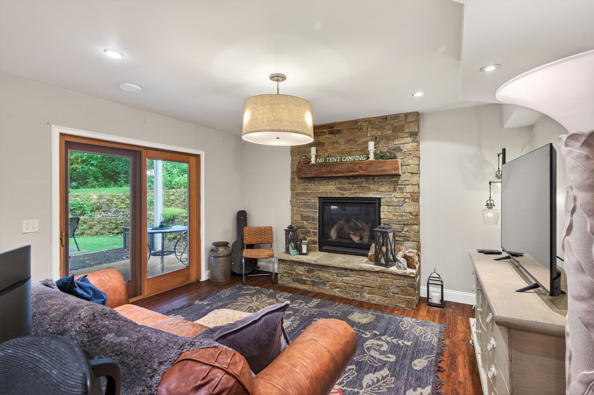 The lower level is walkout, complete with a huge 4th bedroom, full bath, amusement room with a wet bar and huge storage room. It all walks out to your private backyard.