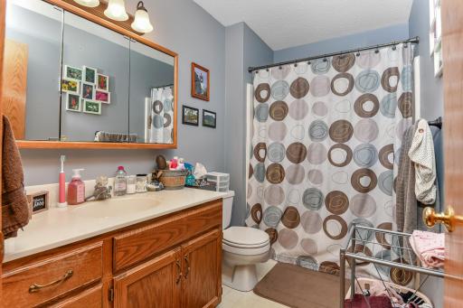 Main bath conveniently located - tons of natural light streams down from the skylight!