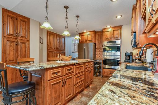 Tons of cabinet space highlighted by undercabinet and toe kick lighting.