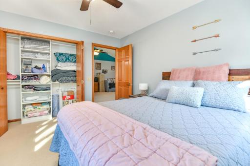 1 of 2 bedrooms off the bonus area with custom closet organizer