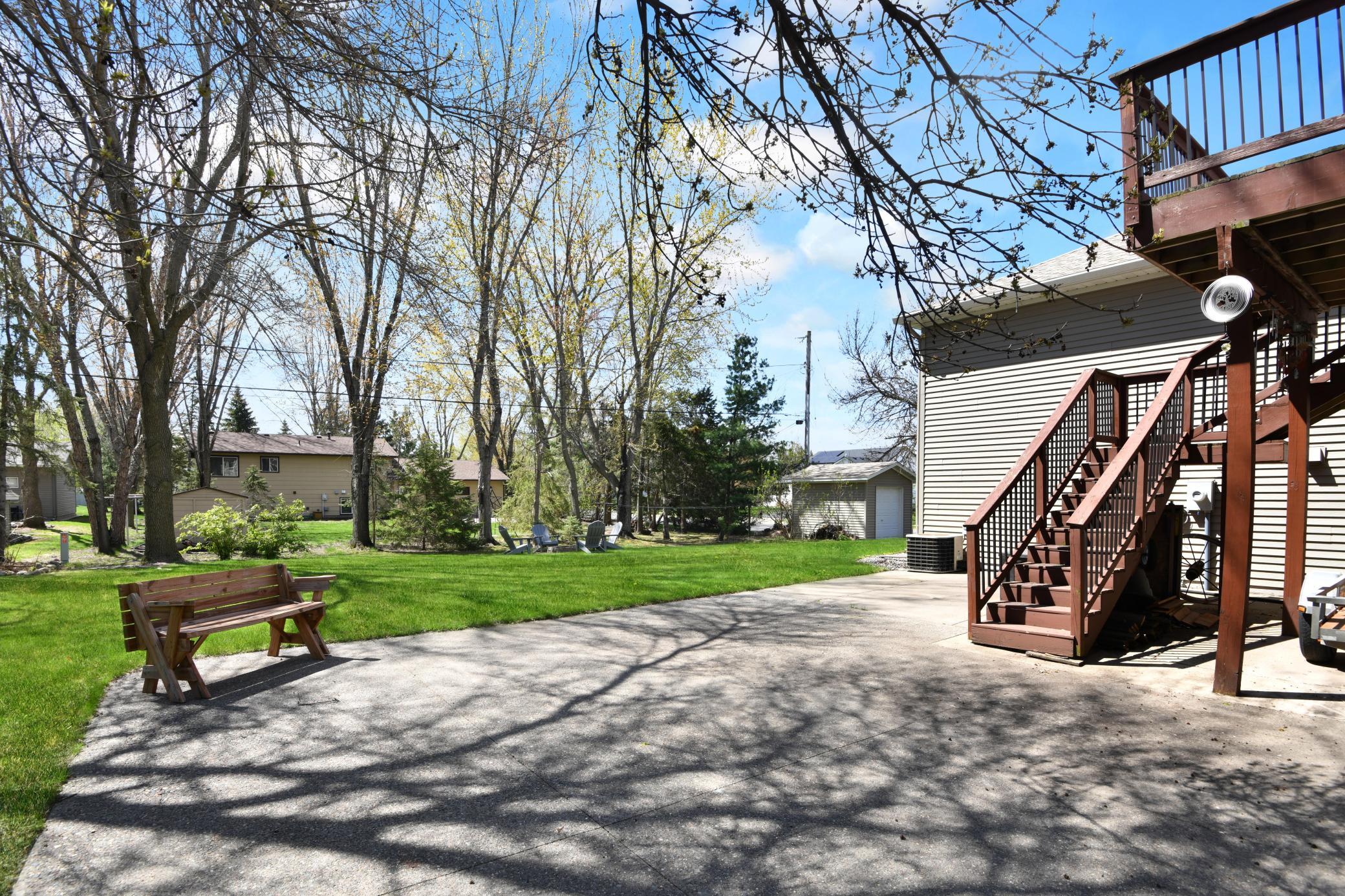 Deck, patio and fire pit welcomes entertaining & relaxing