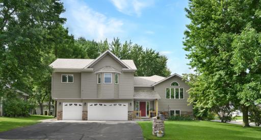 826 3rd St N Sartell~A Fantastic location near Sartell schools, parks and recreation~A large corner lot, beautifully adorned with mature trees & great curb appeal!