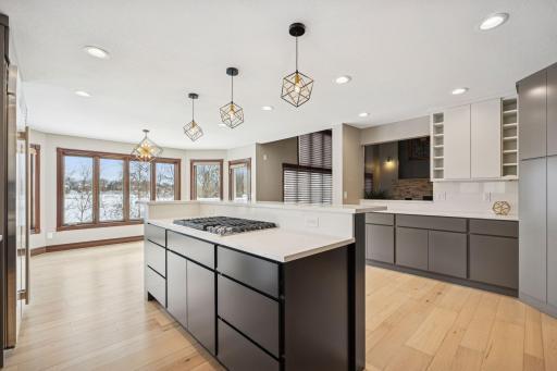 The kitchen effortlessly opens to the living room, providing a bright, connected space perfect for entertaining.