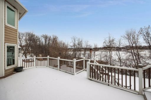 Relax and take in serene views from the home’s multi-tier deck.