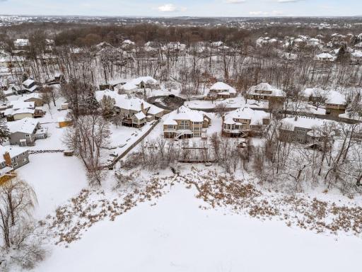 The property overlooks a picturesque pond, offering peaceful views and frequent wildlife sightings.