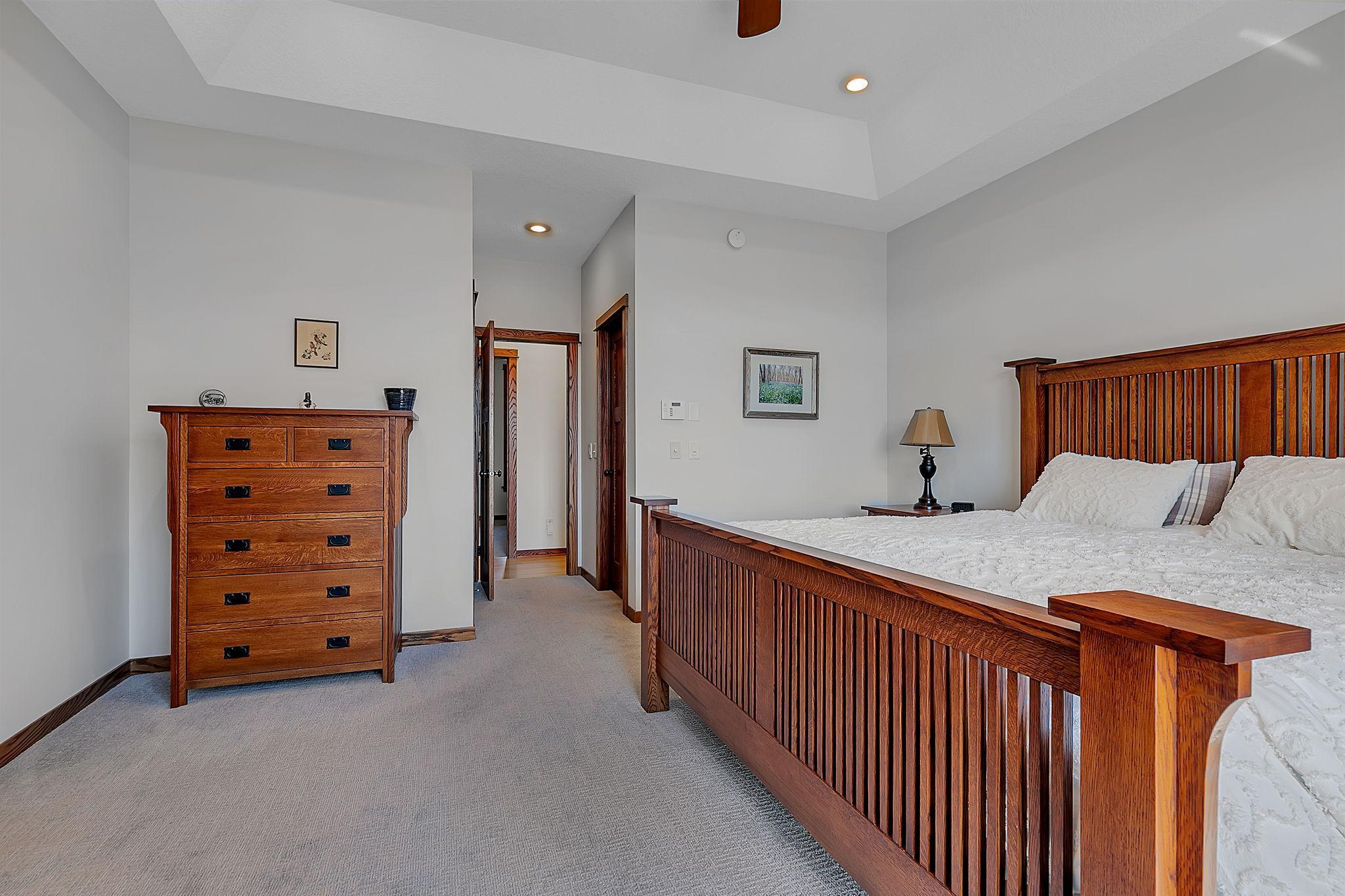 In the primary suite, two large closets on either side of the entry provide generous storage and a well-organized layout.