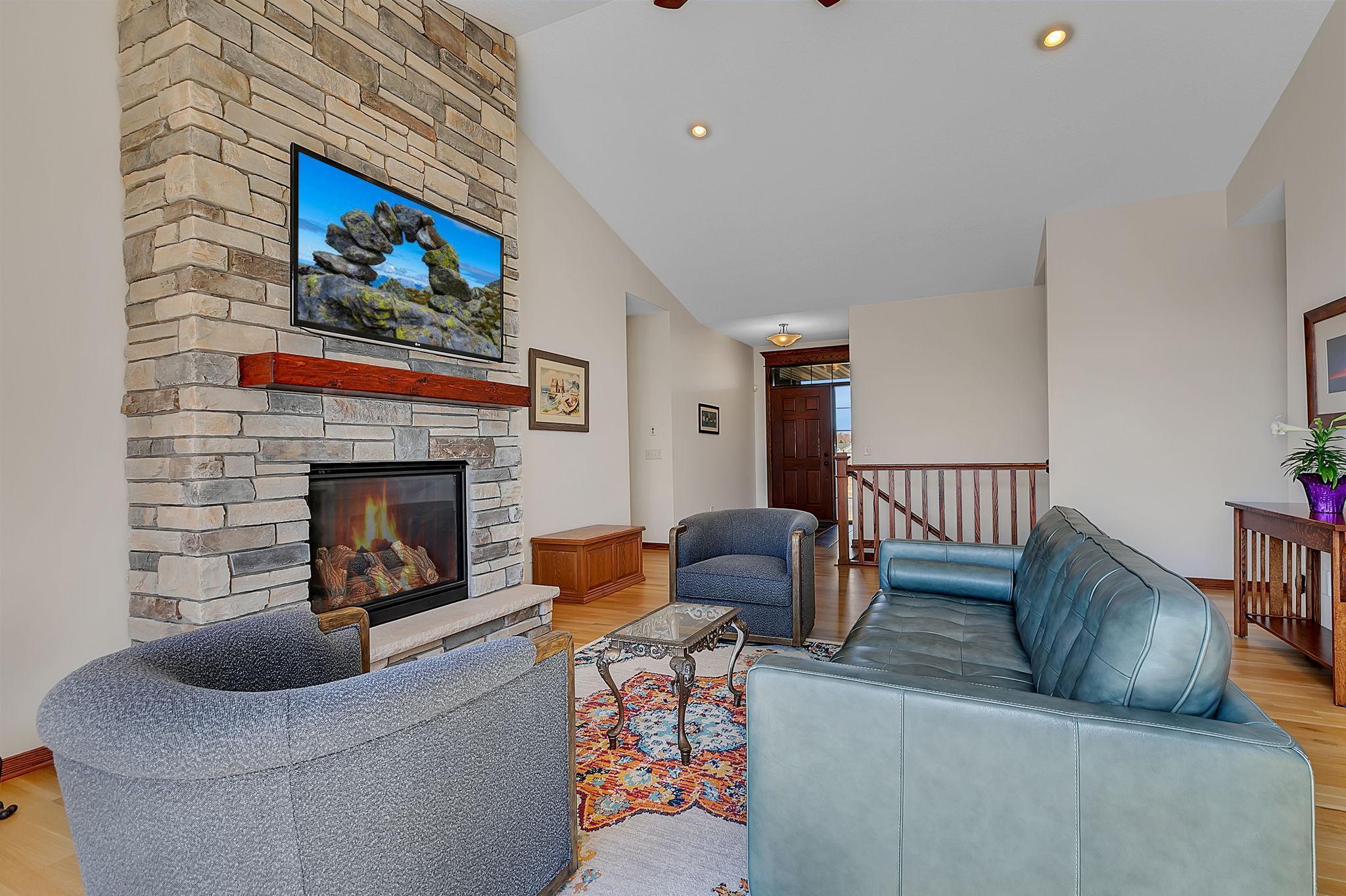 Another perspective of the living room, looking toward the front door, highlighting the open and inviting layout.