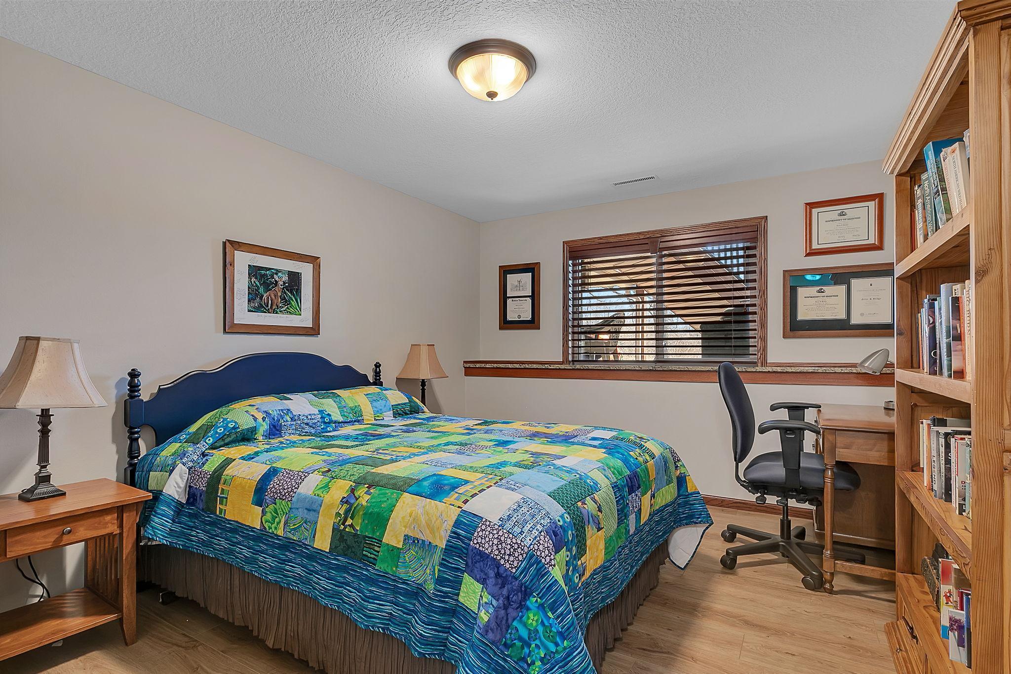 The lower level also features two additional bedrooms; pictured here is the fourth bedroom.