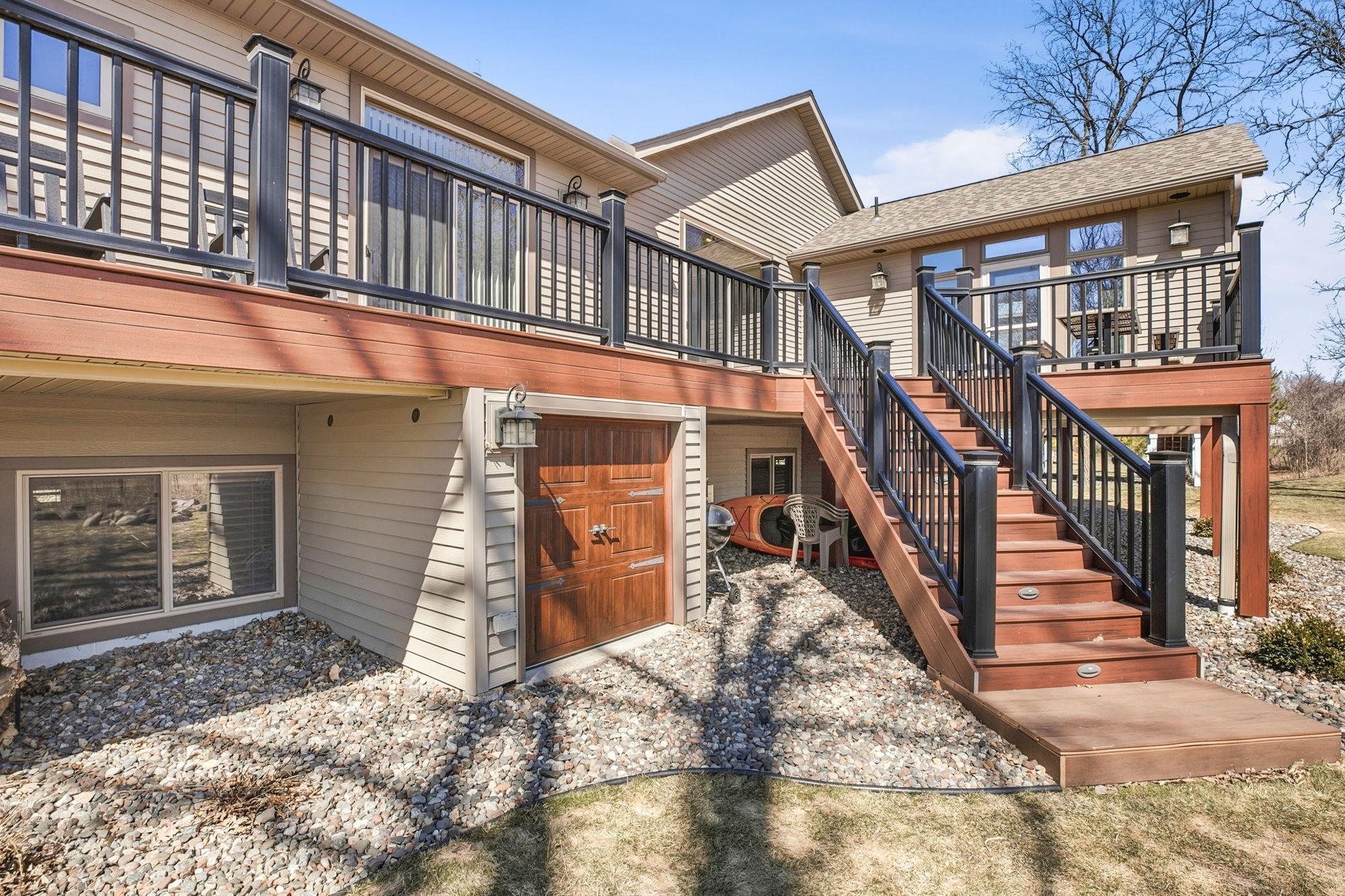 Handy storage space tucked beneath the backyard deck, perfect for keeping outdoor gear, tools, or seasonal items organized and out of sight.
