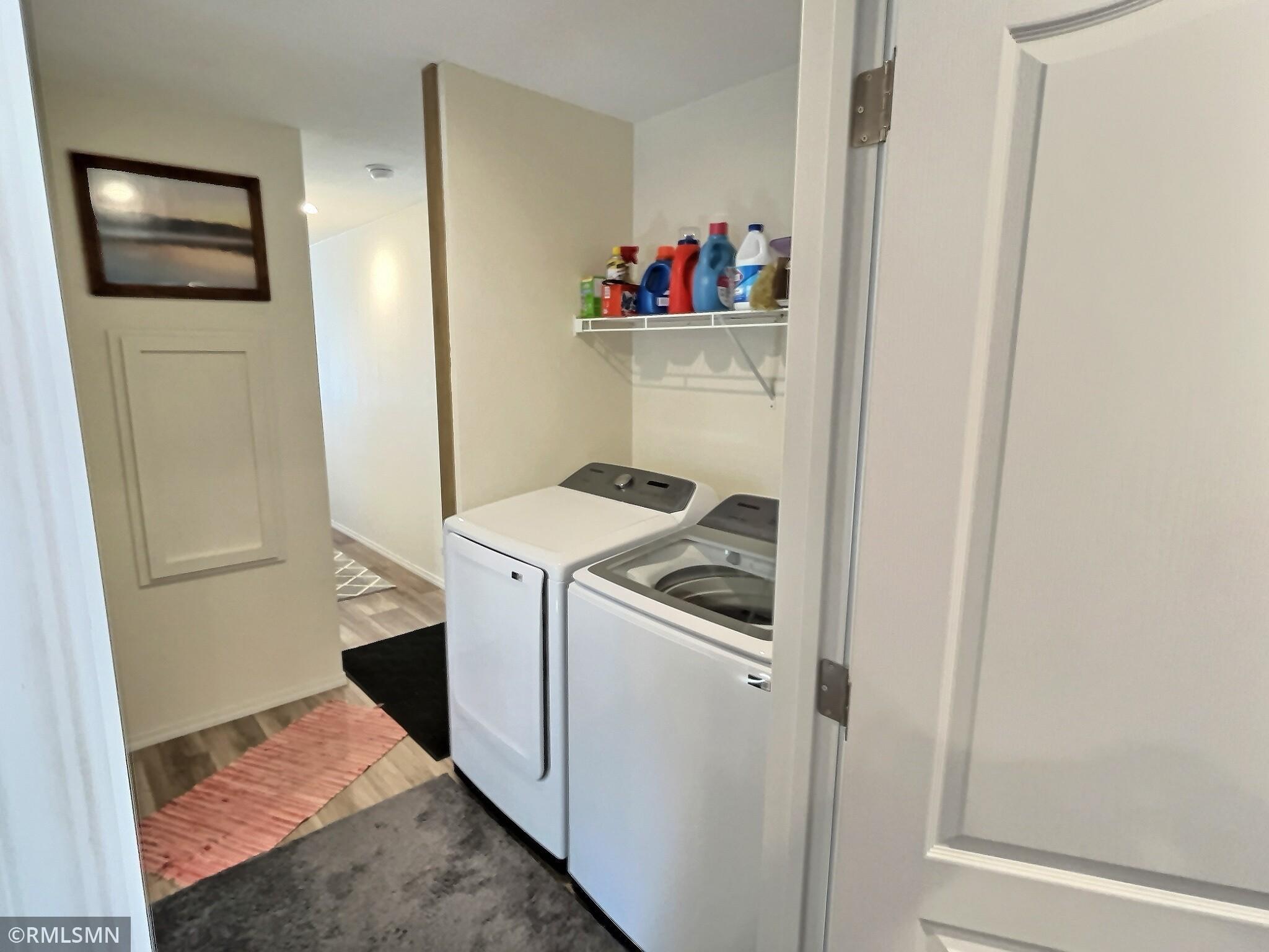 Laundry area in great location to be utilized by both bedrooms.