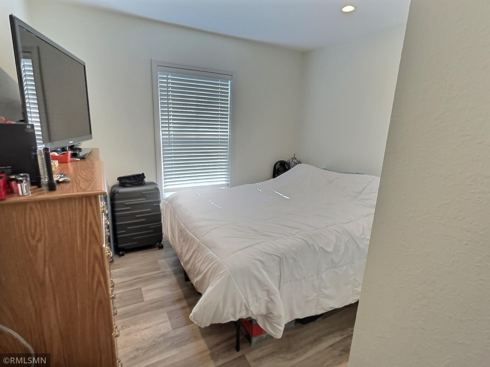 This is the second bedroom which offer ample room for family or guests.