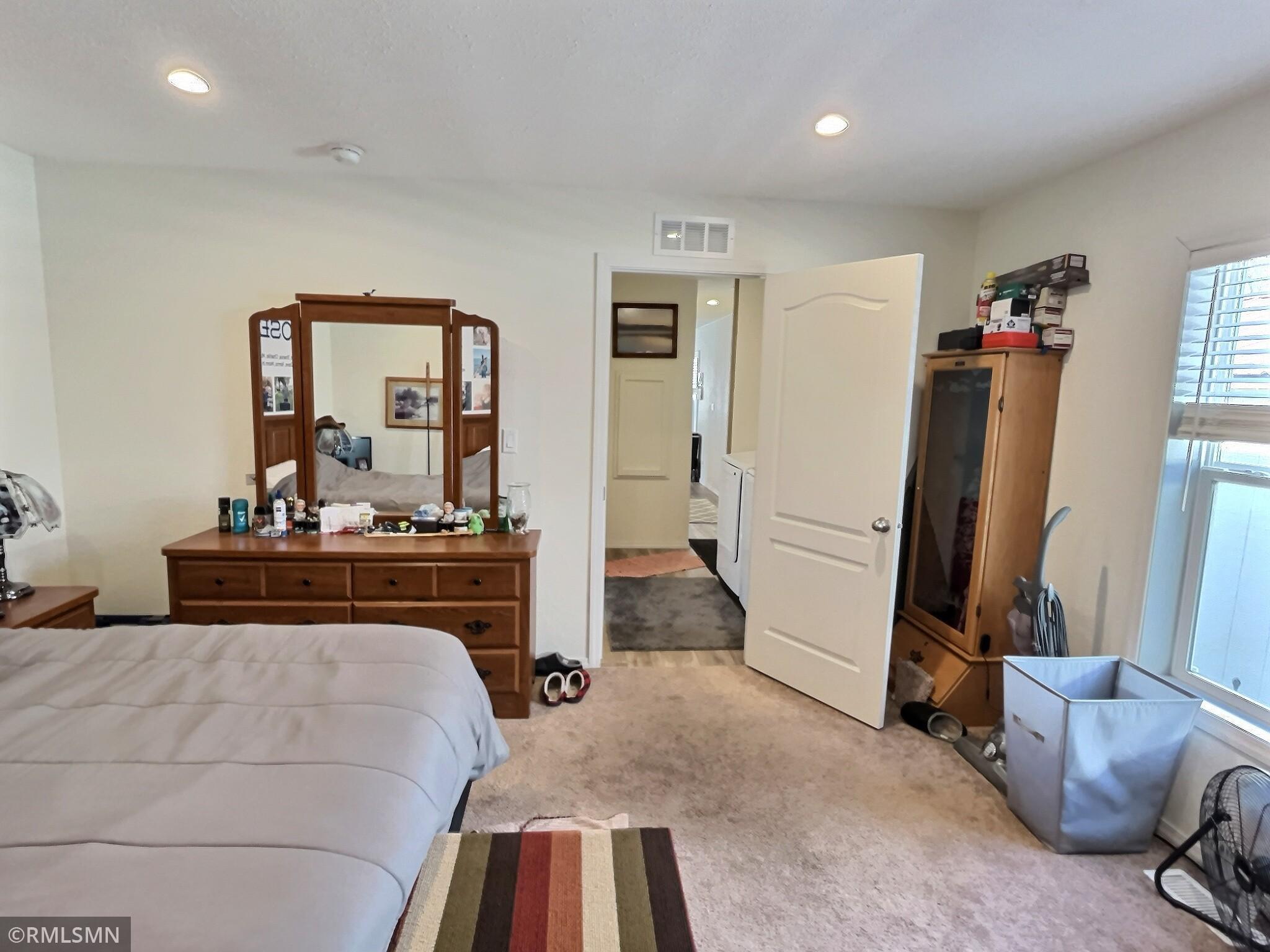 The primary suites entrance from the living area of the home.