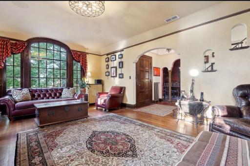 Spacious Living Room w/ 3 sides of windows.