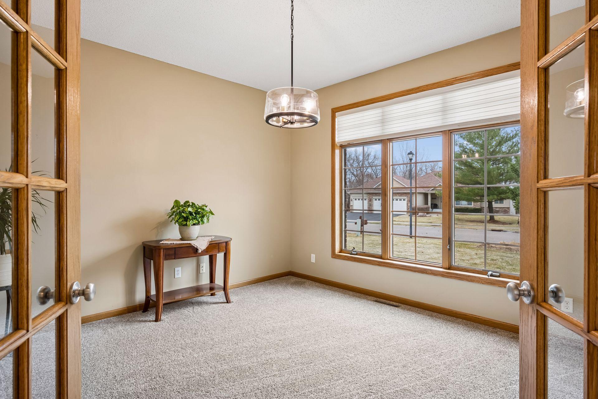 Dedicated main level office with french doors